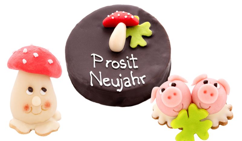 Zu Silvester schenkt man in Österreich gerne Glücksbringer aus Marzipan wie die Schweinchen von frömmel's Konditorei.
